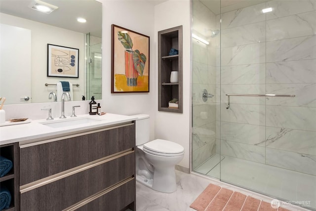 full bathroom with marble finish floor, visible vents, toilet, a stall shower, and vanity