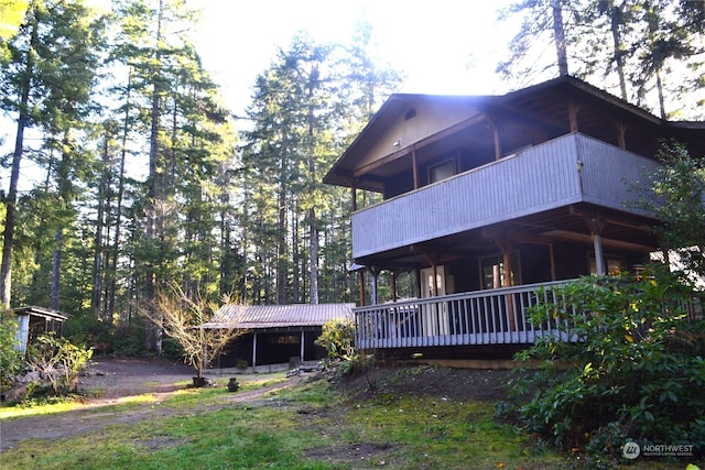 view of property exterior featuring a balcony