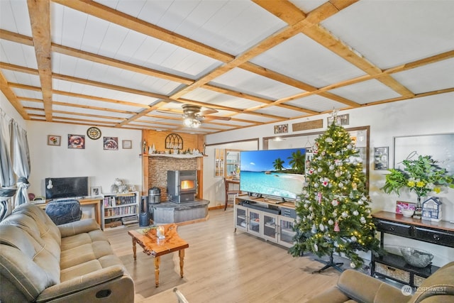 living room with beam ceiling, light hardwood / wood-style floors, ceiling fan, and coffered ceiling