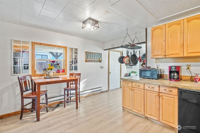 kitchen featuring black appliances, light brown cabinetry, and light hardwood / wood-style flooring