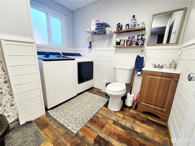 bathroom featuring hardwood / wood-style floors, vanity, and toilet