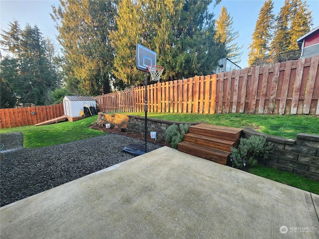 view of patio featuring a storage unit