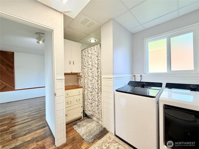 117 Heritage Dr, Elma, WA 98541 - laundry room with visible vents, washer and clothes dryer, laundry area, and wood finished floors