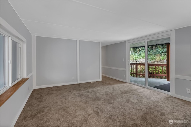 empty room featuring carpet flooring