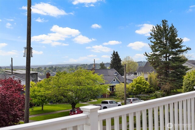 balcony featuring a residential view