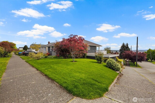 view of front of home with a front yard