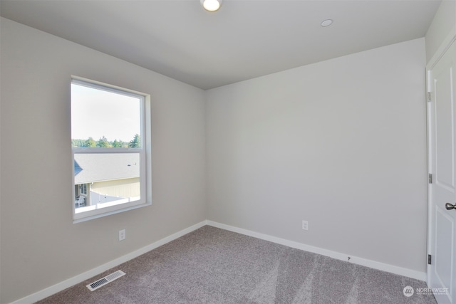 view of carpeted spare room