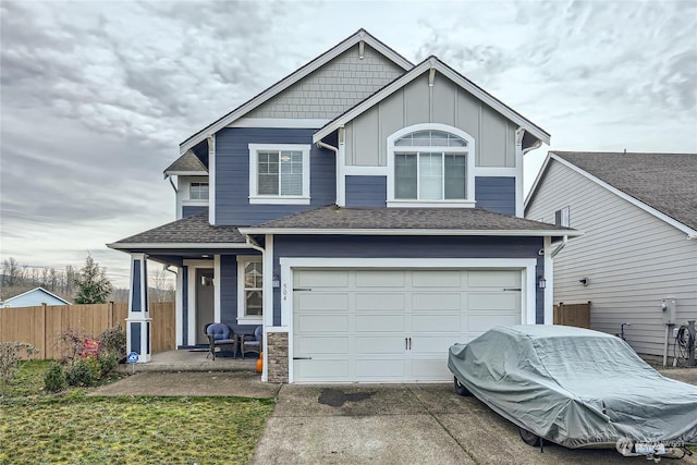 view of front facade featuring a porch and a garage