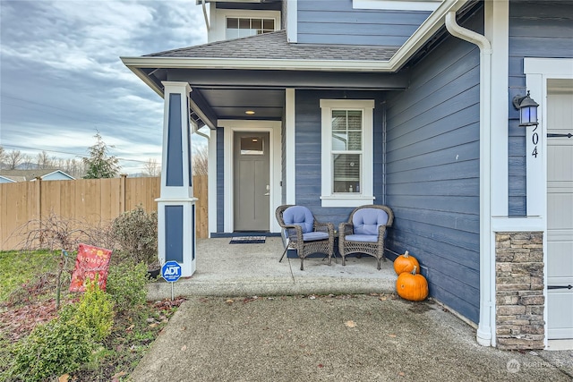 property entrance featuring covered porch