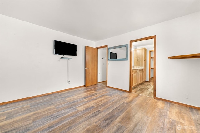 unfurnished living room with light hardwood / wood-style flooring