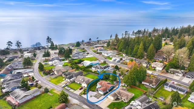 bird's eye view with a water view