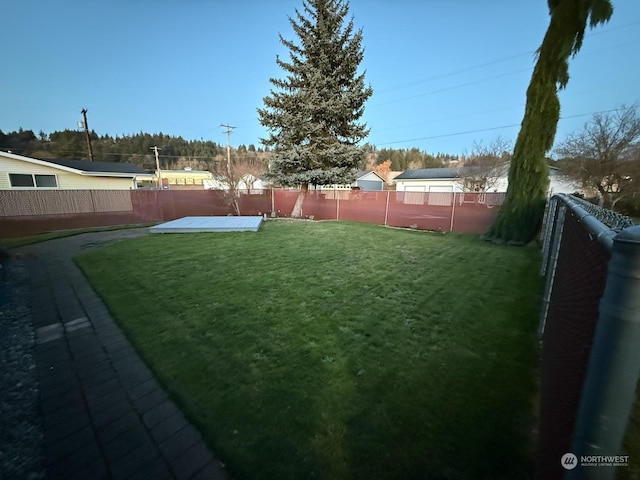 view of yard featuring a fenced backyard