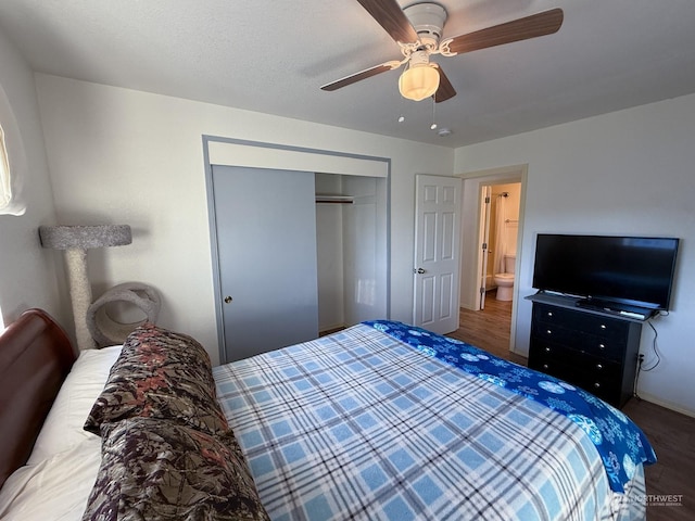 bedroom featuring a closet, a ceiling fan, and wood finished floors