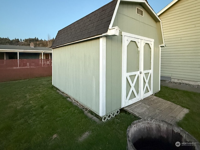 view of outdoor structure with a yard