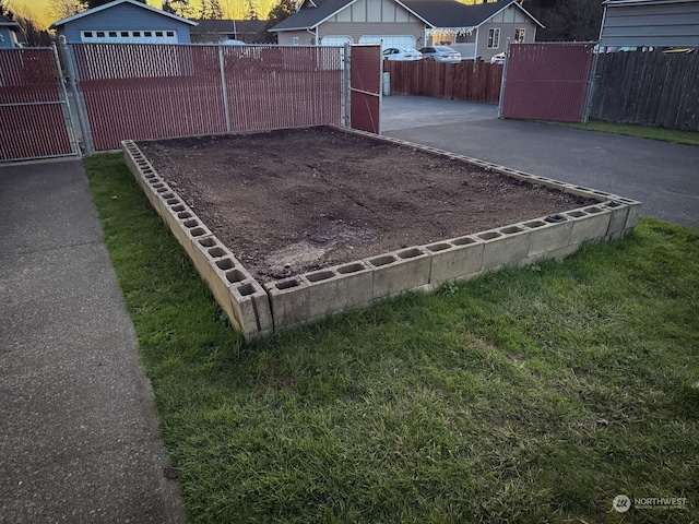 view of yard featuring a gate and fence