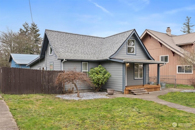 view of front of property with a front lawn