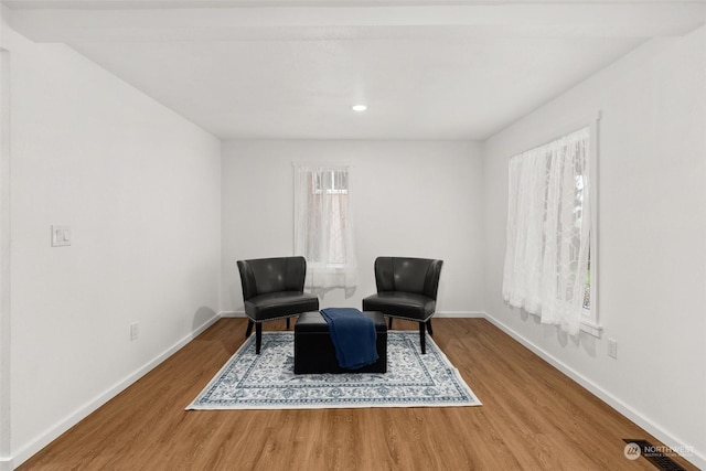 sitting room featuring hardwood / wood-style flooring