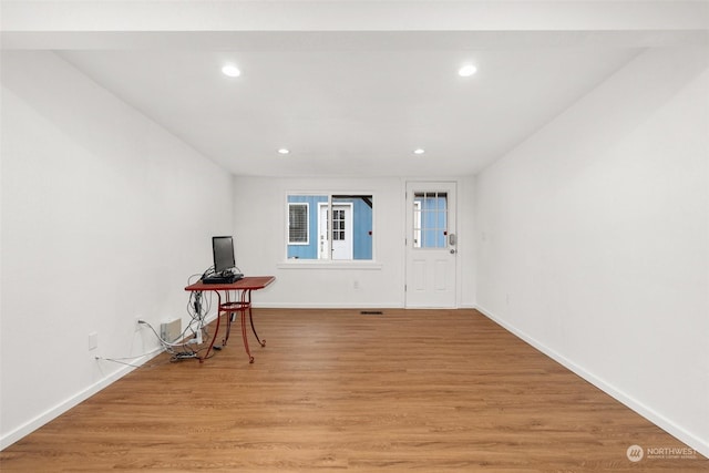 foyer with light hardwood / wood-style floors