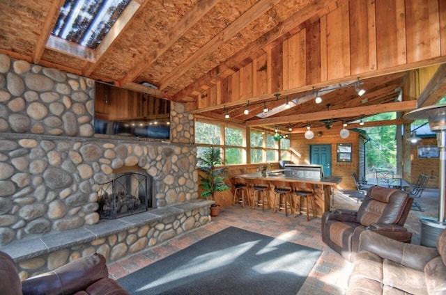 1546 Reservation Rd SE Unit 42, Olympia, WA 98513 - living room featuring a stone fireplace and lofted ceiling