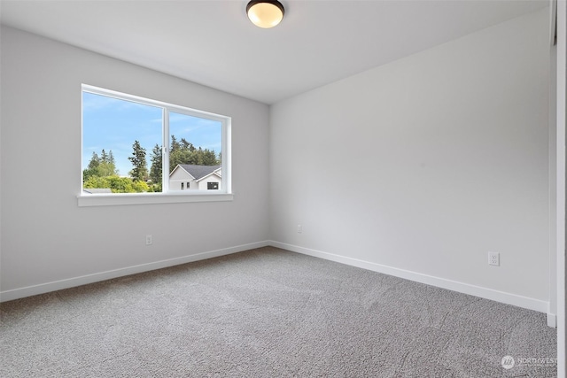 empty room featuring carpet flooring