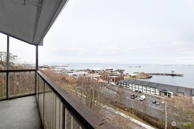 balcony featuring a water view