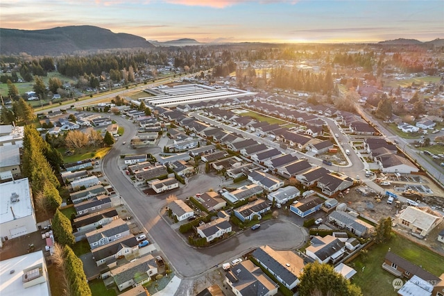 aerial view at dusk with a mountain view