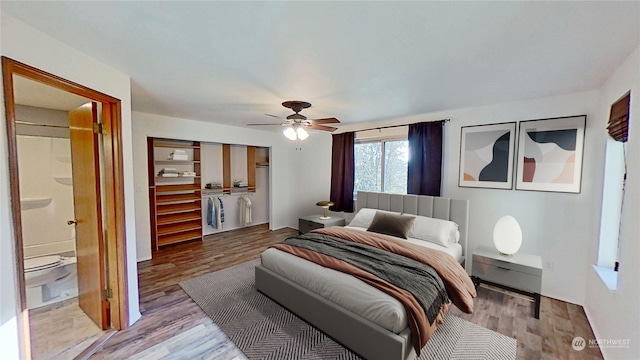 bedroom featuring a closet, ceiling fan, and light wood-type flooring