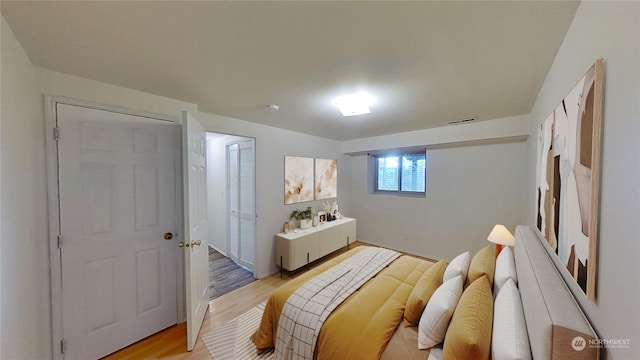 bedroom featuring light wood-type flooring