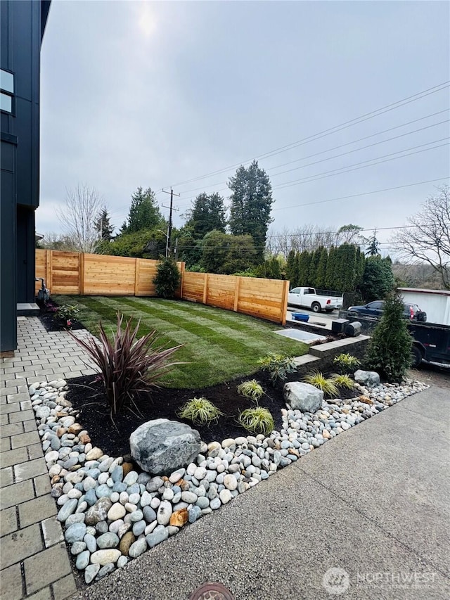 view of yard featuring fence