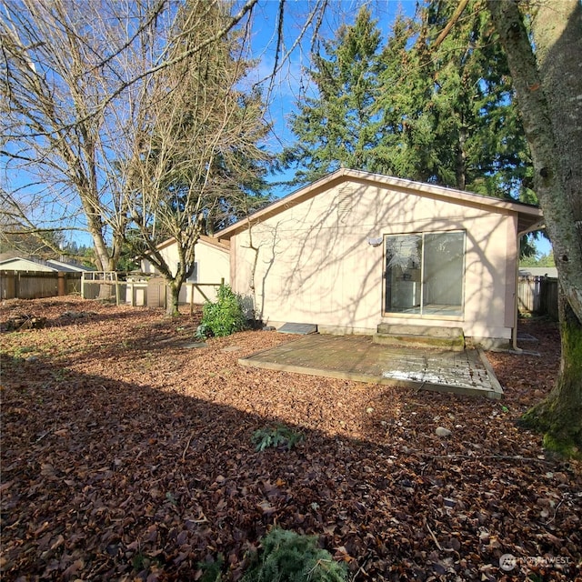 rear view of house with a patio