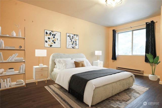 bedroom featuring dark hardwood / wood-style floors and a baseboard radiator