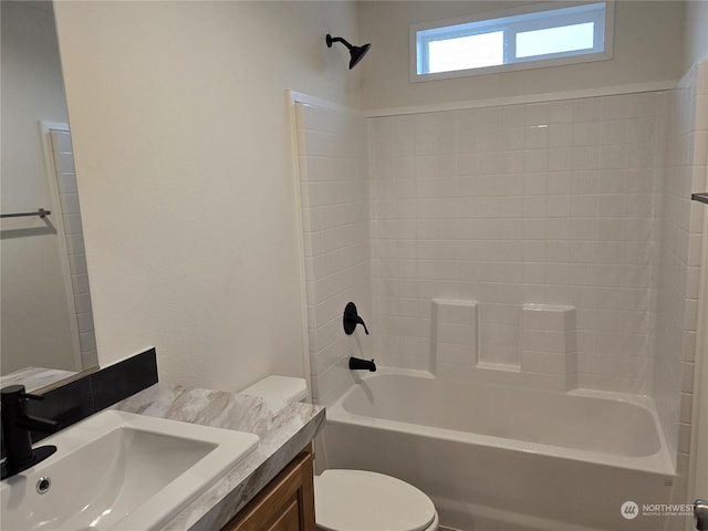 full bathroom featuring vanity, toilet, and shower / bathtub combination