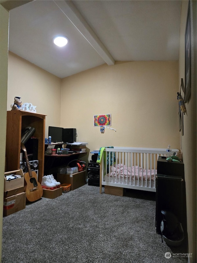 carpeted bedroom featuring lofted ceiling with beams and a crib