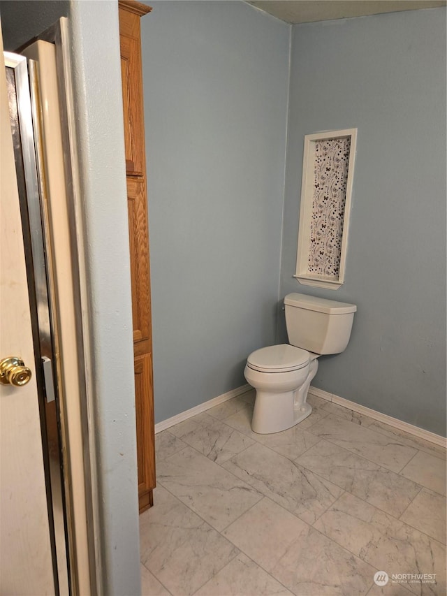 bathroom featuring toilet