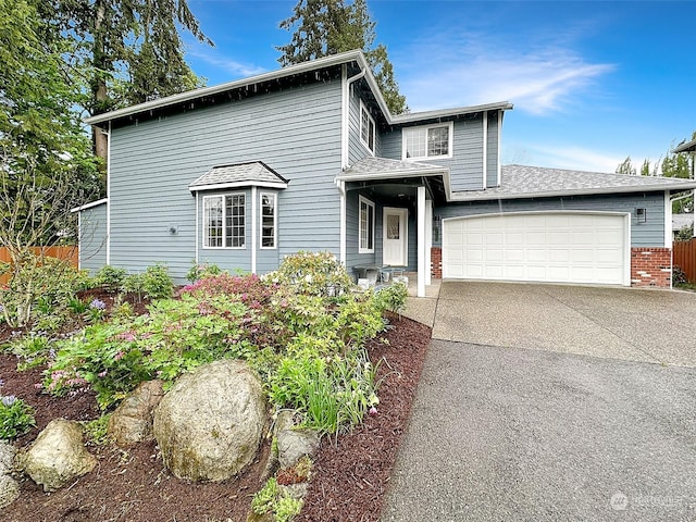 view of front of home with a garage