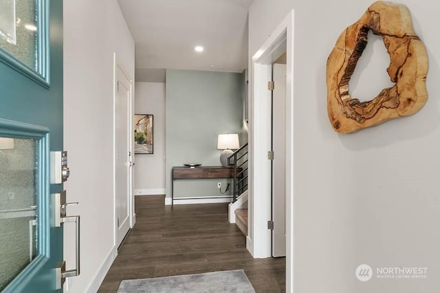 corridor featuring dark hardwood / wood-style floors