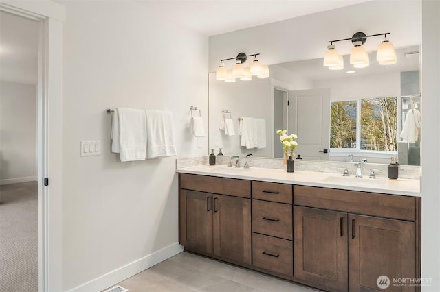 21416 116th Ave SE Unit 5, Kent, WA 98031 - bathroom with double vanity and baseboards