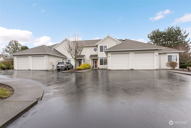 view of front of property featuring a garage