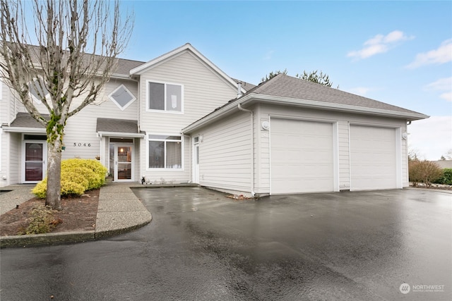 view of front of property with a garage