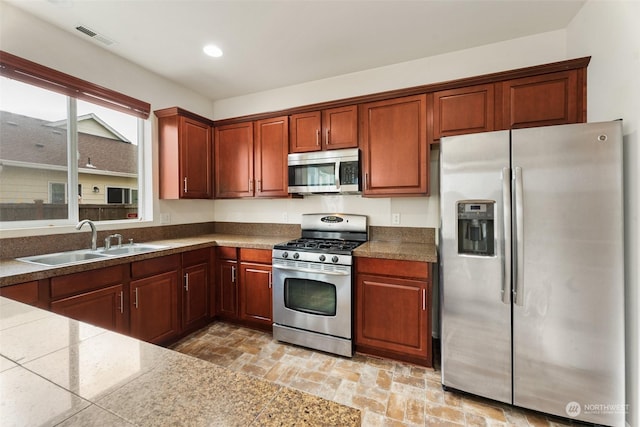 kitchen featuring sink and stainless steel appliances