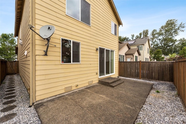 back of house featuring a patio