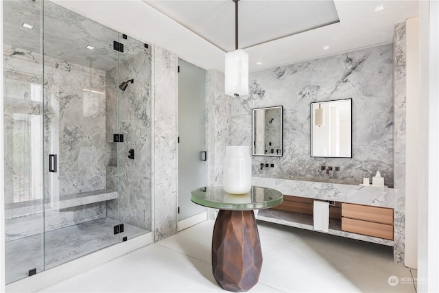 5505 Lake Washington Blvd NE Unit 1-D, Kirkland, WA 98033 - bathroom featuring vanity, a marble finish shower, and recessed lighting