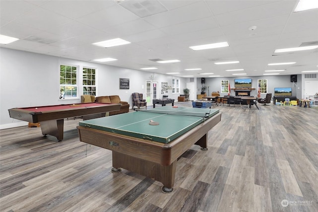 playroom featuring wood-type flooring, a drop ceiling, and billiards