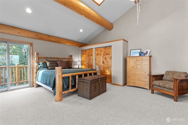 bedroom featuring access to exterior, beamed ceiling, light colored carpet, and high vaulted ceiling