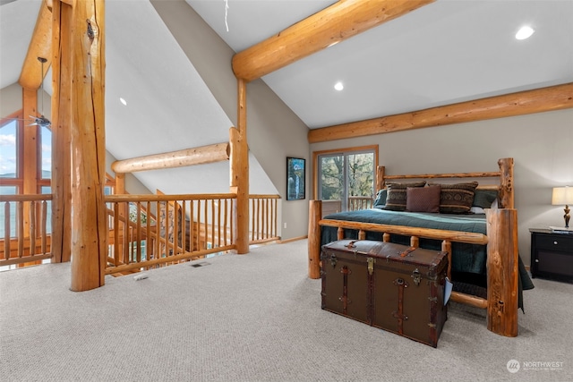 bedroom featuring lofted ceiling with beams and light colored carpet