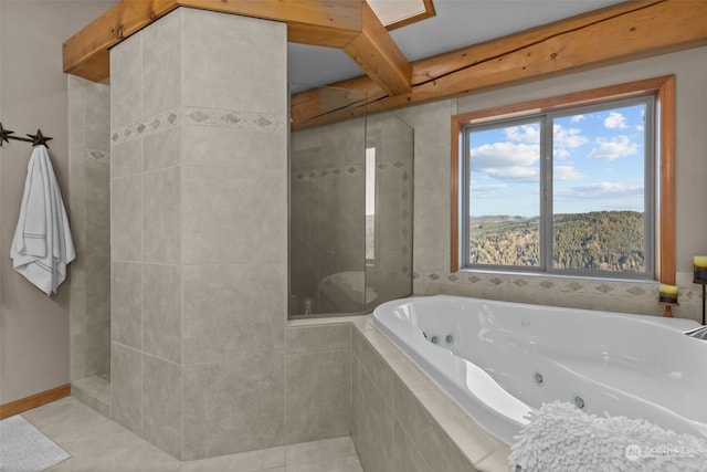 bathroom with tile patterned flooring and independent shower and bath