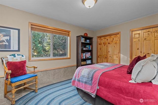 bedroom featuring two closets