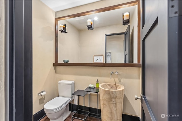 bathroom featuring toilet