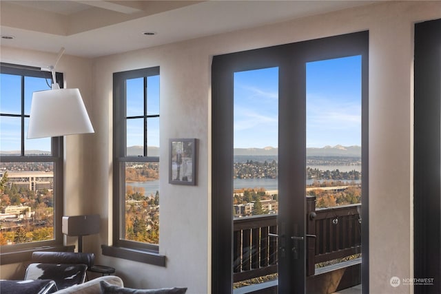 interior space featuring a water and mountain view