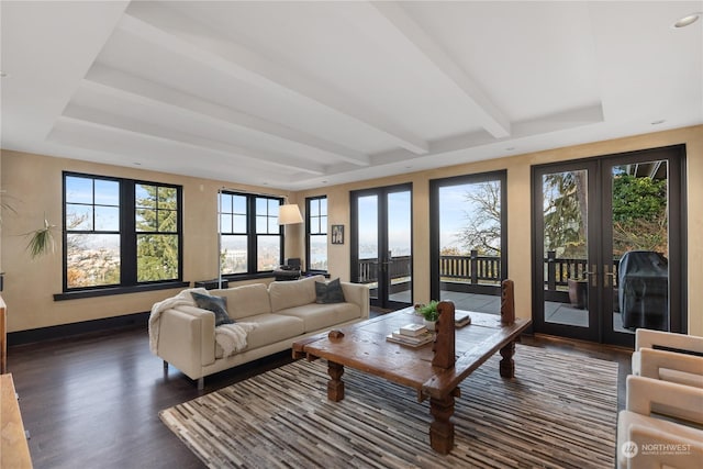 living room with french doors, dark hardwood / wood-style flooring, and beam ceiling